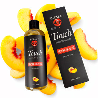 TOUCH edible massage oil bottle with peach and argan oil by INTAKE