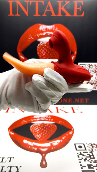 Close-up of the curved dildo tongue of Tongue Action toy with suction feature.