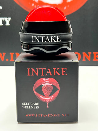 Massage ball on INTAKE box with red branding