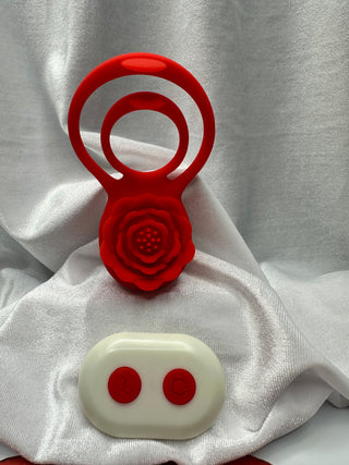 INTAKE product display featuring red silicone Rose Grip penis vibrator and wireless remote control.