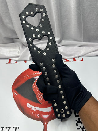 Black Love Taps paddle displayed with wrist loop for storage and safety