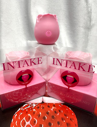 INTAKE Pink Throb rose toy with 10 throbbing vibration modes.